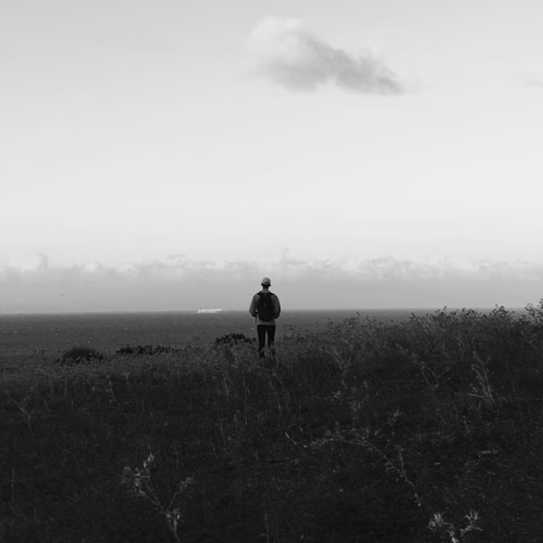 Solopreneur walking through misty field